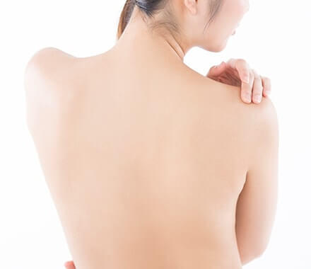 女性の肩こり画像